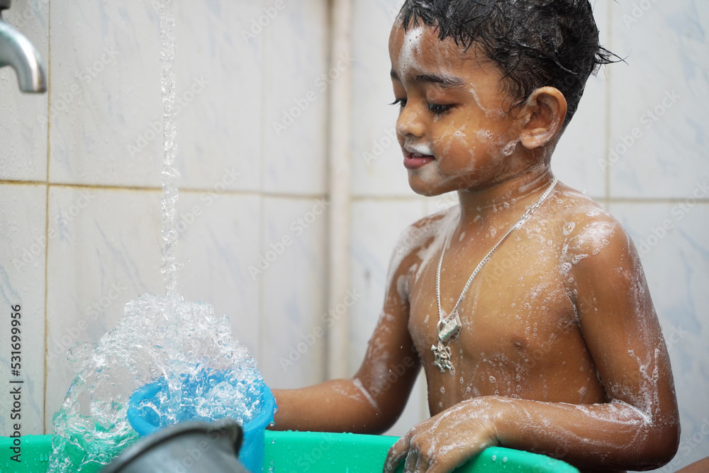 Boy Taking Bath In Bathroom Stock Photo Adobe Stock