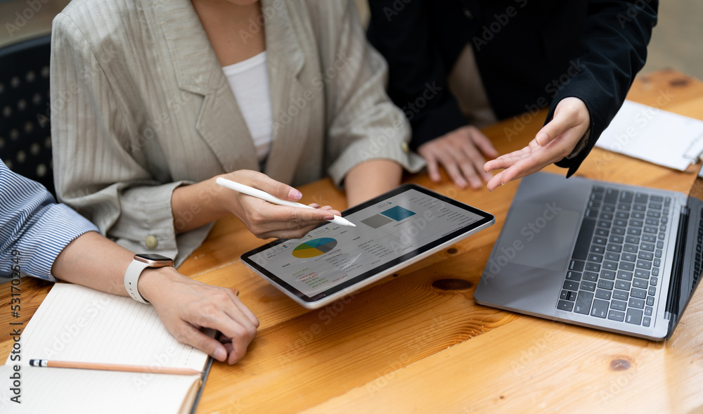 Business people are meeting for analysis data figures to plan business strategies. Business discussing concept Business people are meeting for analysis data figures to plan business strategies. Business discussing concept