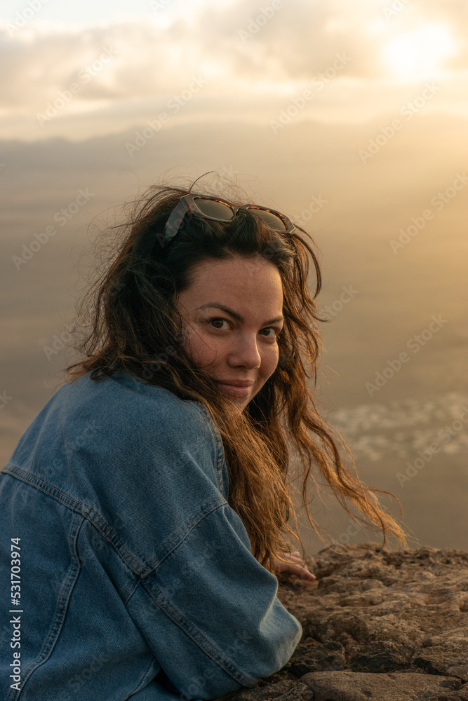 young girl at sunset