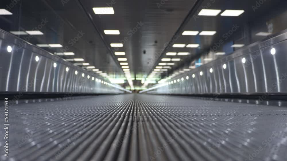 A drive on moving walkway, close up view
