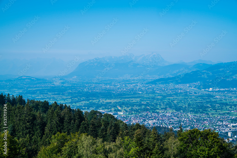 Austria, view above bregenz city houses and luxembourg and switzerland mountains to saentis summit snow covered panorama