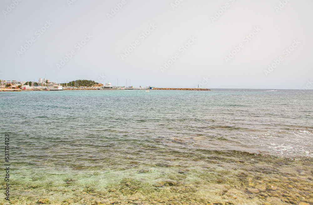 Mediterranean Sea with clear water at main beach of Santa Eulalia del Rio, Ibiza