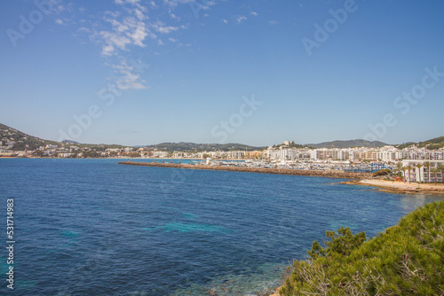 Beautiful seascape of the Mediterranean Sea and rocky coast of Ibiza island with bay of Santa Eulalia del Rio, Spain