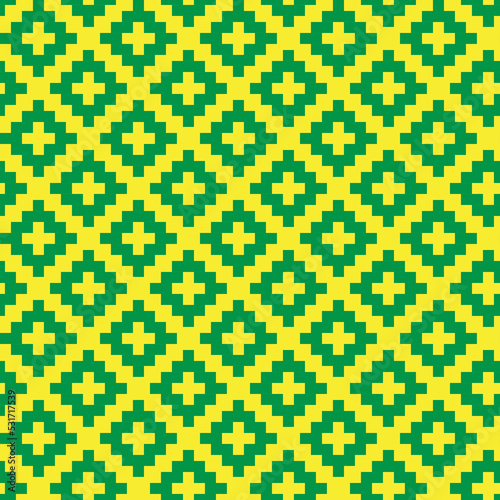 Green cross-stitch knitting pattern on yellow background. Green square dots on yellow backdrop. Fabric pattern design for sale. Knitting handicraft art.