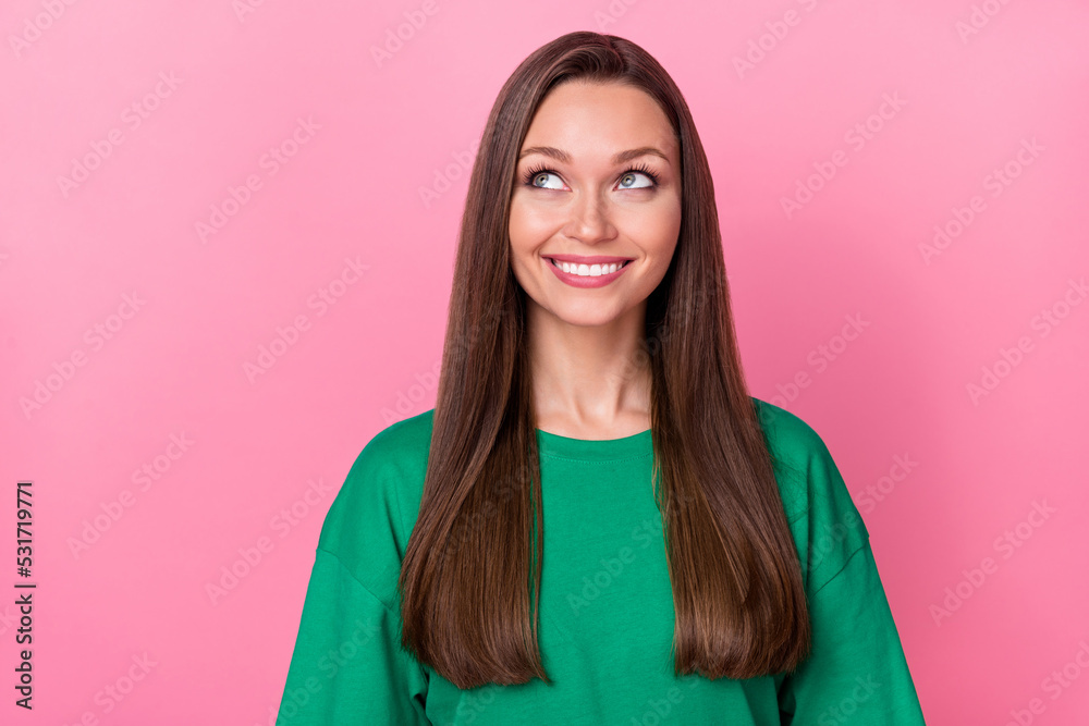 Photo of adorable positive person beaming smile look interested empty space isolated on pink color background Photo of adorable positive person beaming smile look interested empty space isolated on pink color background