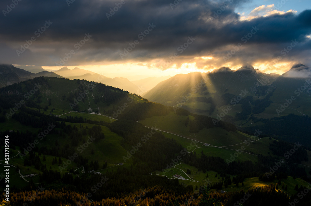 dramatic lighting in the alpine foothills of Fribourg