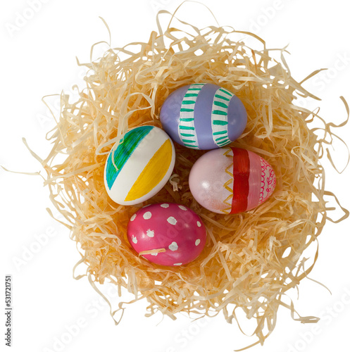 Image of easter decorated eggs in hey
