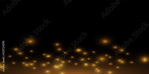 Bright explosion of a star, a fiery beam of light exploded with sparks, an explosion with dust and sparkles on a black background.