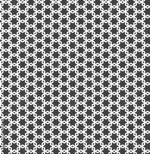 White interlaced pattern on black background. White interlocking pattern on black backdrop.