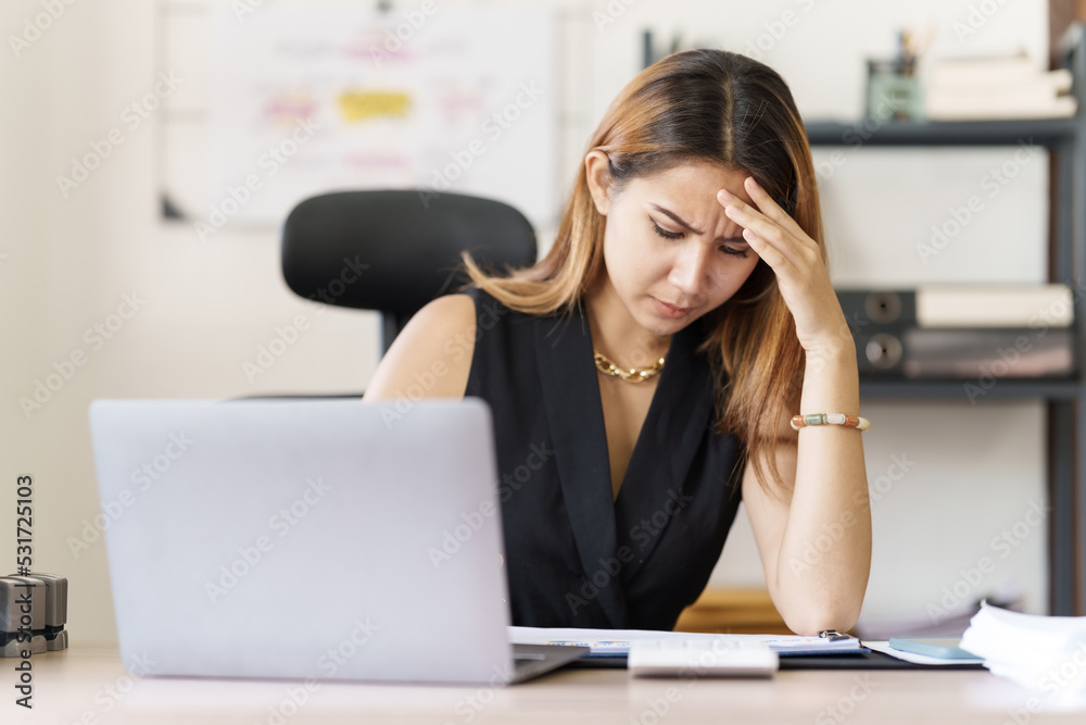 Depressed tired asian businesswoman, stressed at office workplace. Depressed tired asian businesswoman, stressed at office workplace.