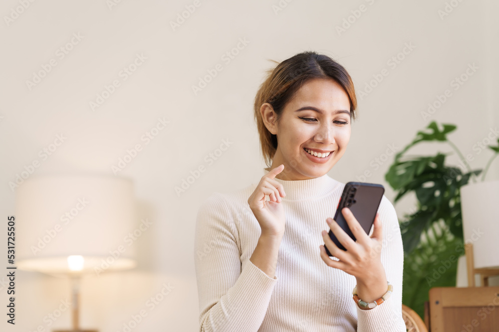 Attractive asian young woman using smartphone working office desk in office workplace. Attractive asian young woman using smartphone working office desk in office workplace.