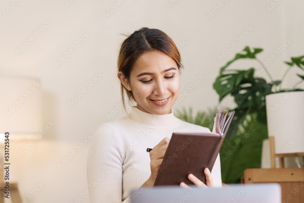 Attractive Asian business accounting working in office workplace, online planning successful business growth process. Attractive Asian business accounting working in office workplace, online planning successful business growth process.