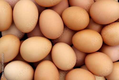 Texture from a large number of chicken eggs close-up.