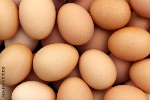 Texture from a large number of chicken eggs close-up.