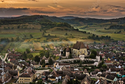 Fantastic shot of Biertan in Transylvania, Romania during sunrise photo