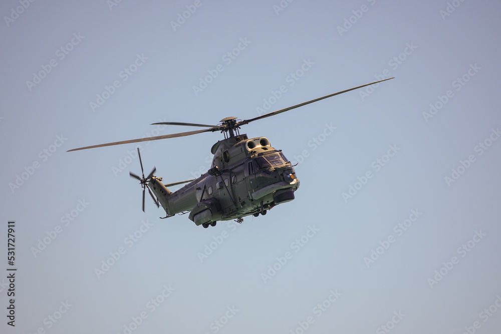 Fototapeta premium Flying military helicopter