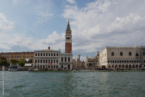 Venice island with the historic buildings the bell tower of San Marco seen from the sea without people