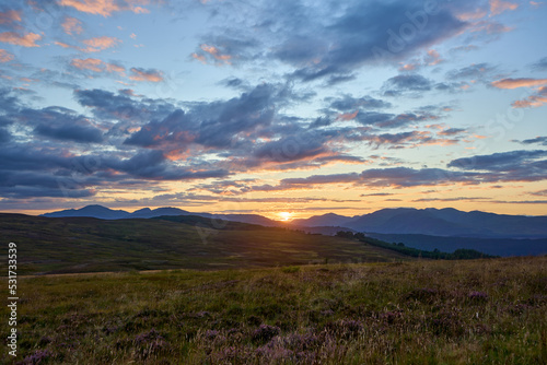 A breathtaking Scottish sunset over the glens and hills