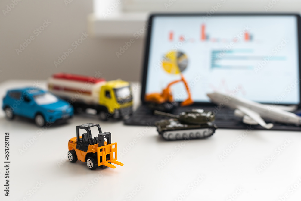 Tablet, a set of toy vehicles