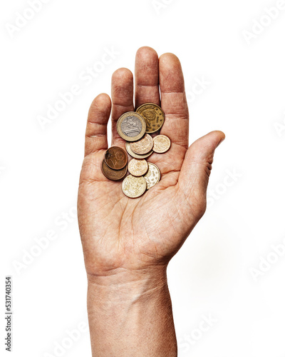 Obraz na plátně Male hand asking for alms, open palm with euro coins isolated on white backgroun