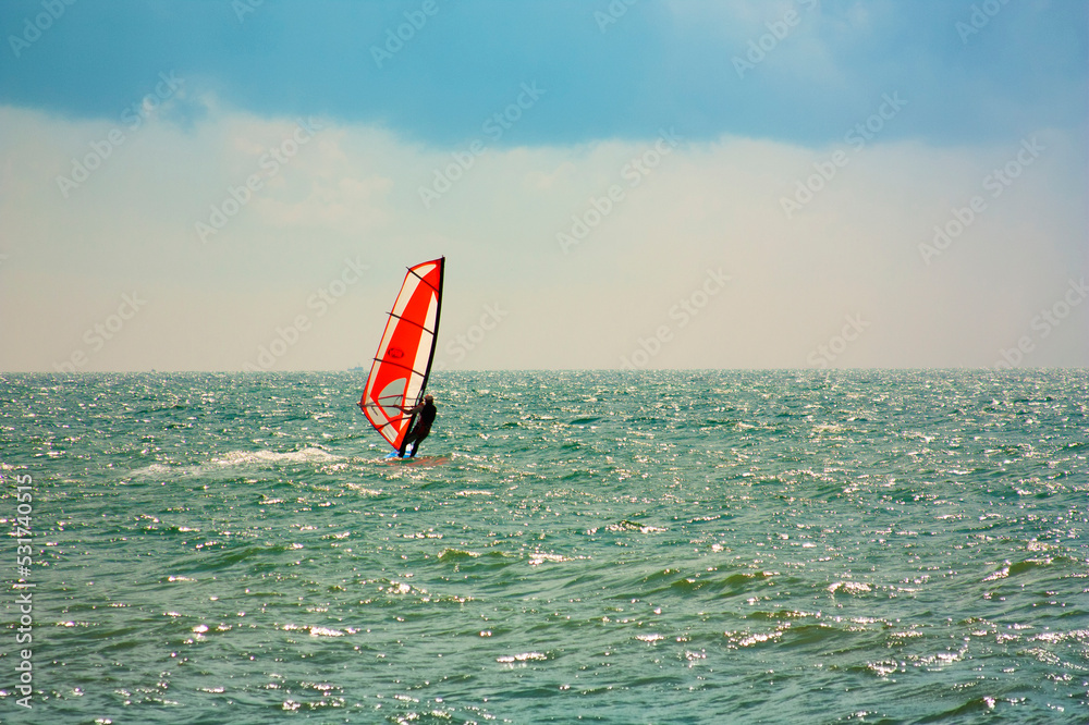 skiing windsurfing in the ocean waves skiing windsurfing in the ocean waves