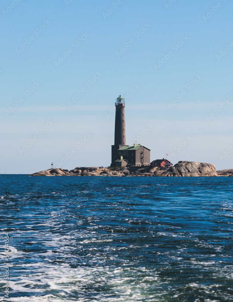 Bengtskär Lighthouse, summer view of Bengtskar island in Archipelago Sea, Finland, Kimitoön, Gulf of Finland sunny day Bengtskär Lighthouse, summer view of Bengtskar island in Archipelago Sea, Finland, Kimitoön, Gulf of Finland sunny day