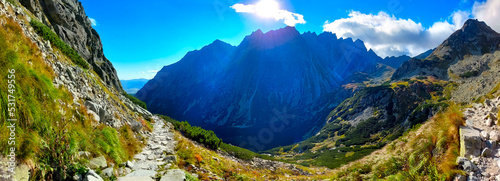 Mountain panorama. Mountain rocky landscape. Panoramic photo of mountain peaks and valleys. Majestic view of the rock peaks. High-resolution picture. Real photo of Tatra Mountains in Slovakia.