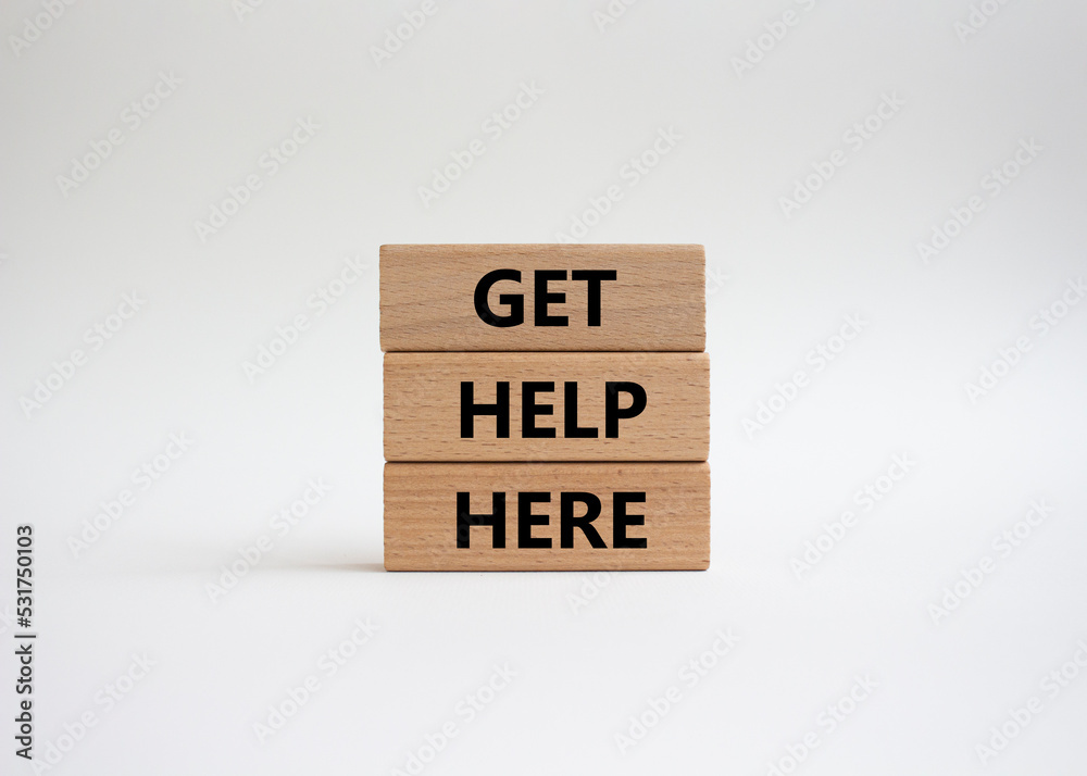 Get help here symbol. Wooden blocks with words Get help here. Beautiful white background. Business and Get help here concept. Copy space. Get help here symbol. Wooden blocks with words Get help here. Beautiful white background. Business and Get help here concept. Copy space.