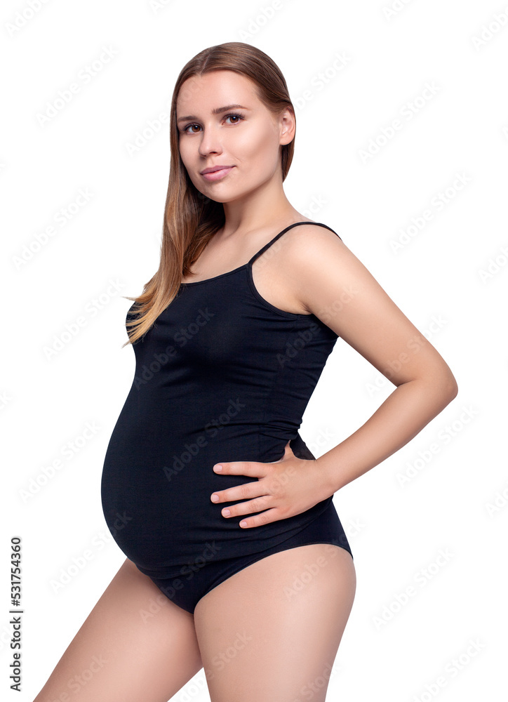 Young pregnant woman in black shirt posing.