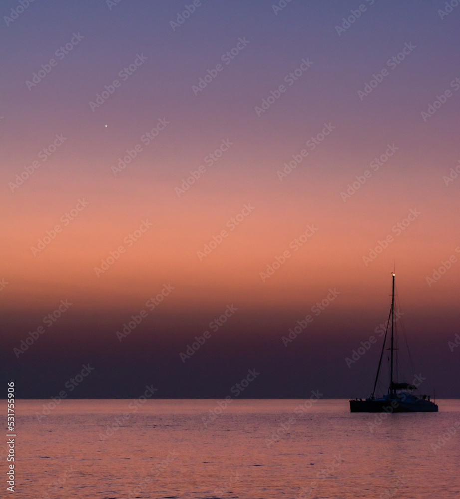 sailboat at sunset