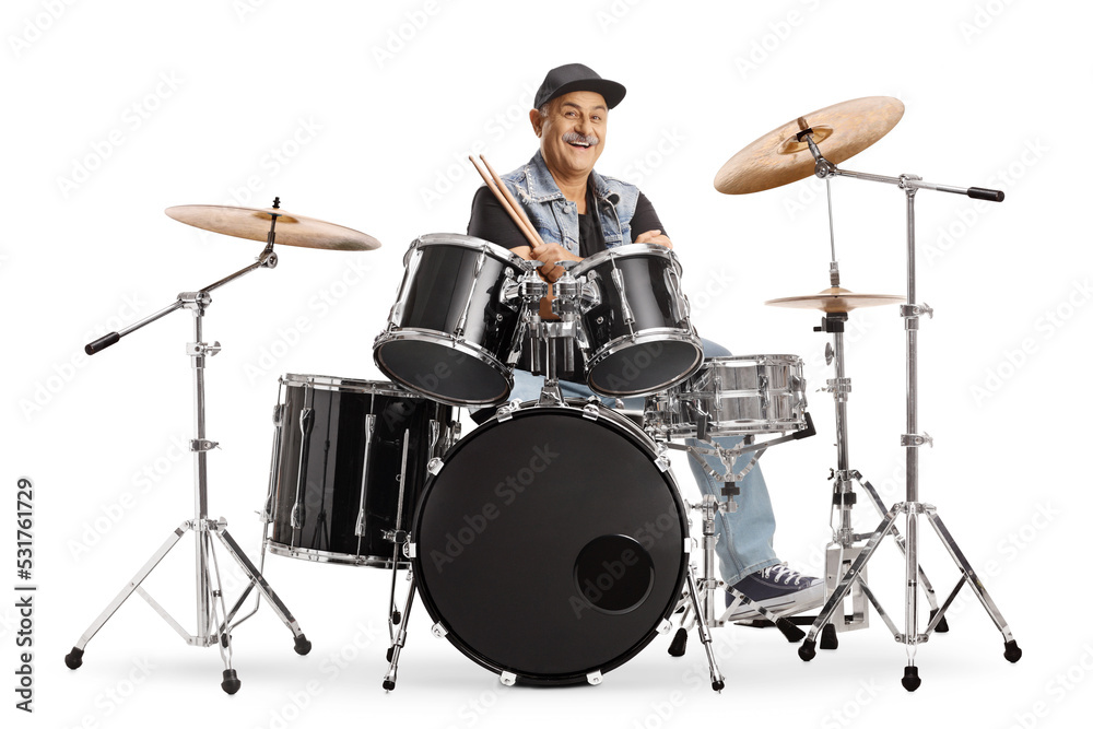 Fototapeta premium Cheerful mature drummer sitting and holding drumsticks