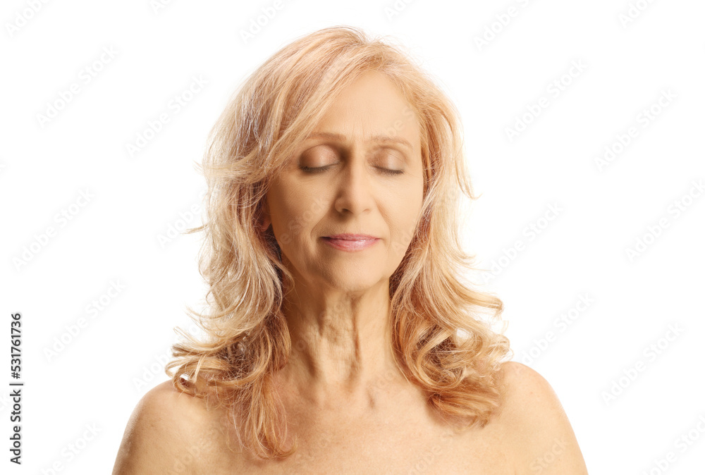 Mature woman with bare shoulders posing with closed eyes Mature woman with bare shoulders posing with closed eyes