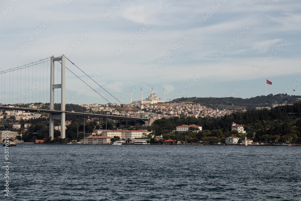 View of Bosphorus bridge and Asian side of Istanbul. It is a sunny summer day. Beautiful scene.