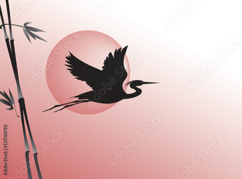 A flying heron bird (stork, crane) and a cane against a red sky and the sun at sunrise or sunset. Silhouette vector drawing.