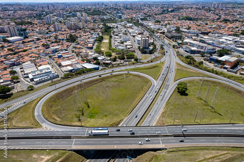 Aerial view of Jardim do Trevo, city of Campinas in the interior of São Paulo. Cars passing by the Anhanguera highway.