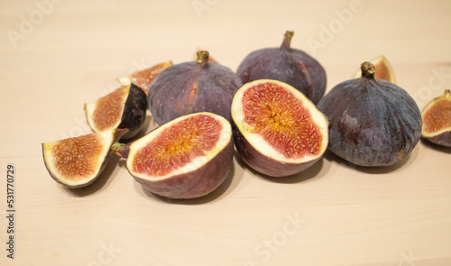 figs on a light table surface. Exotic fruits, vitamins, problems with the supply of fruit to Russia
