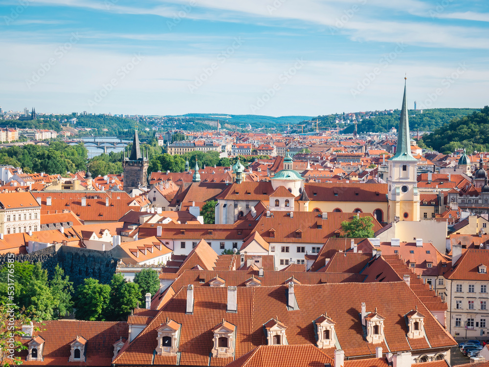 Aerial view with the beautiful city of Prague and the red brick roofs of the old houses in the old town , Czech Republic