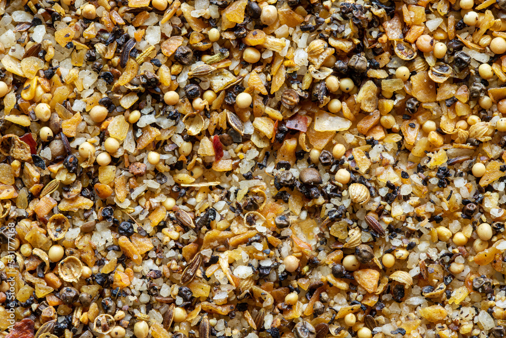 A mixture of different spices close up. Textures of colorful spices and condiments. Spice blend for steak A mixture of different spices close up. Textures of colorful spices and condiments. Spice blend for steak