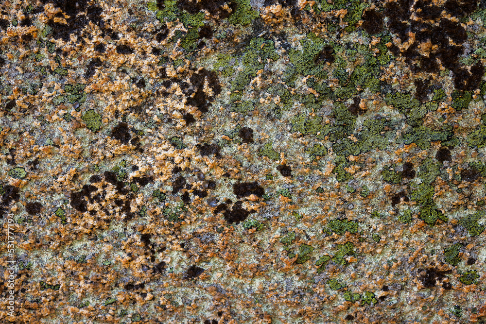 Detail of a granite rock. Natural granite texture. Detail of a granite rock. Natural granite texture.