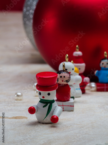 small dolls and christmas balls