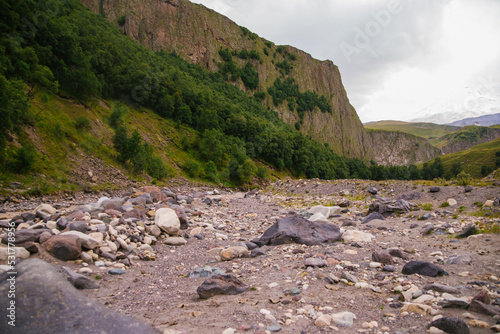 Muddy river water. Spring flood. Mountain river or stream. Nature of the Caucasus. The Elbrus region.