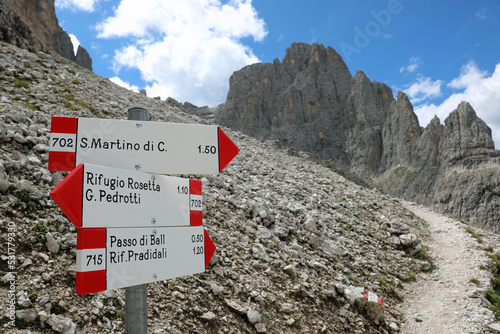 sign with the places of the Italian mountain near the village of San Martino di Castrozza in Italy photo