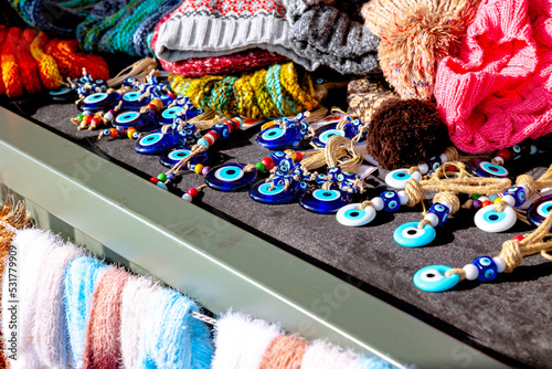 Evil eye beads or nazar boncugu. Turkish style souvenirs in the shop photo