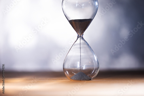 Hourglass on table with copy space