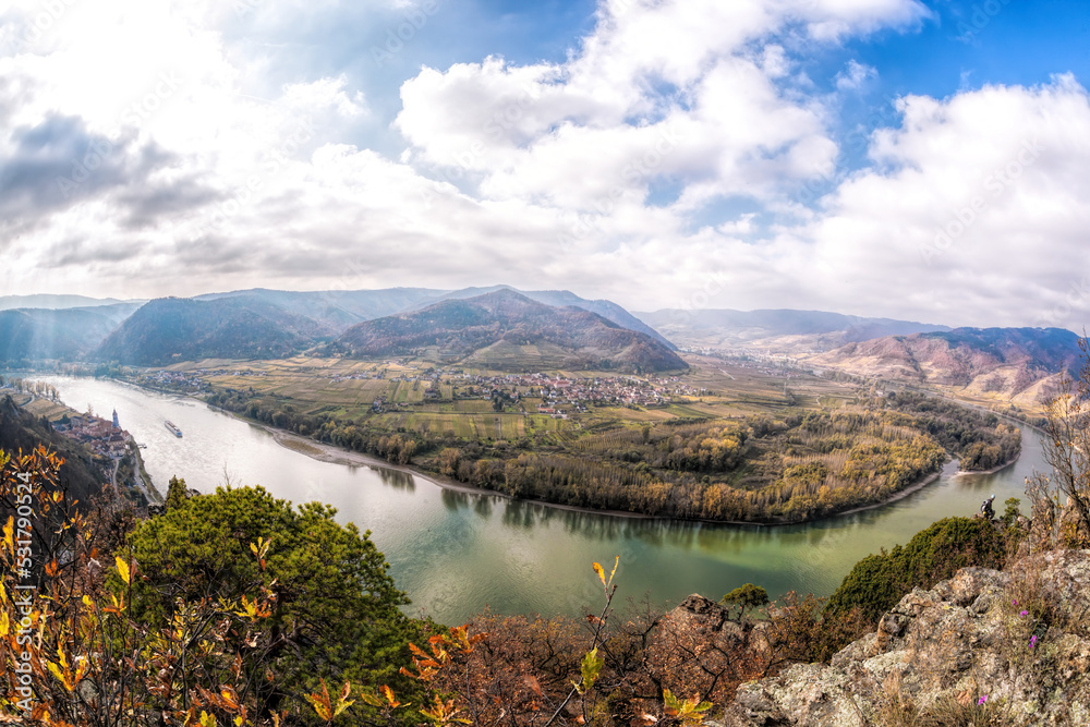 Panorama of Wachau valley with ship on Danube river during autumn in Austria, UNESCO