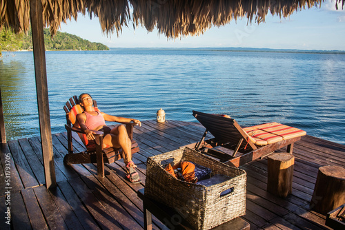 Relaxing on Lake Peten Itza, El Remate, Petén, Guatemala photo