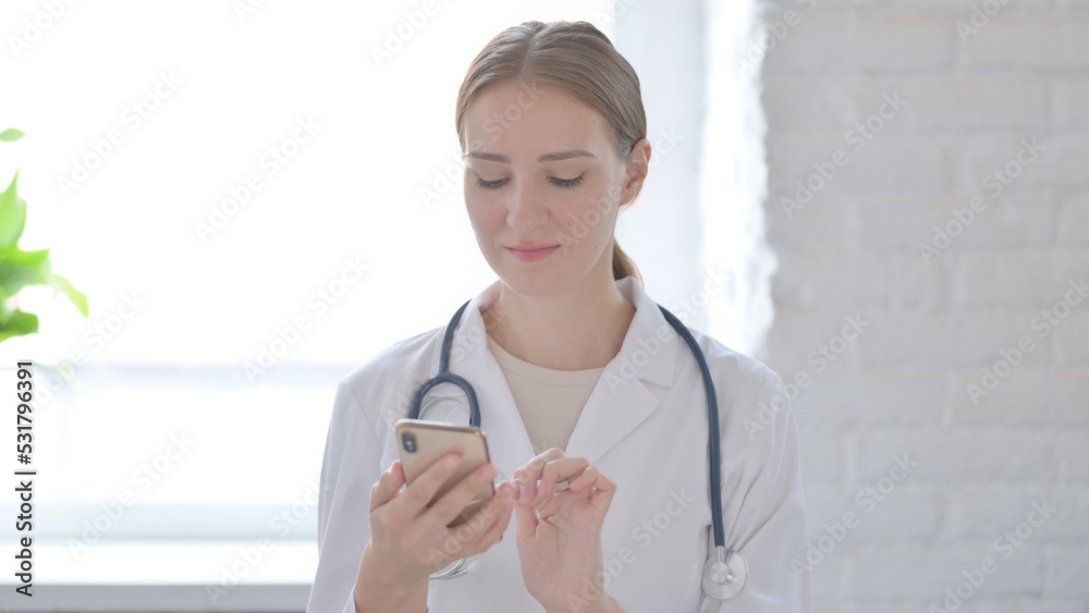 Lady Doctor using Smartphone for Browsing Internet Lady Doctor using Smartphone for Browsing Internet