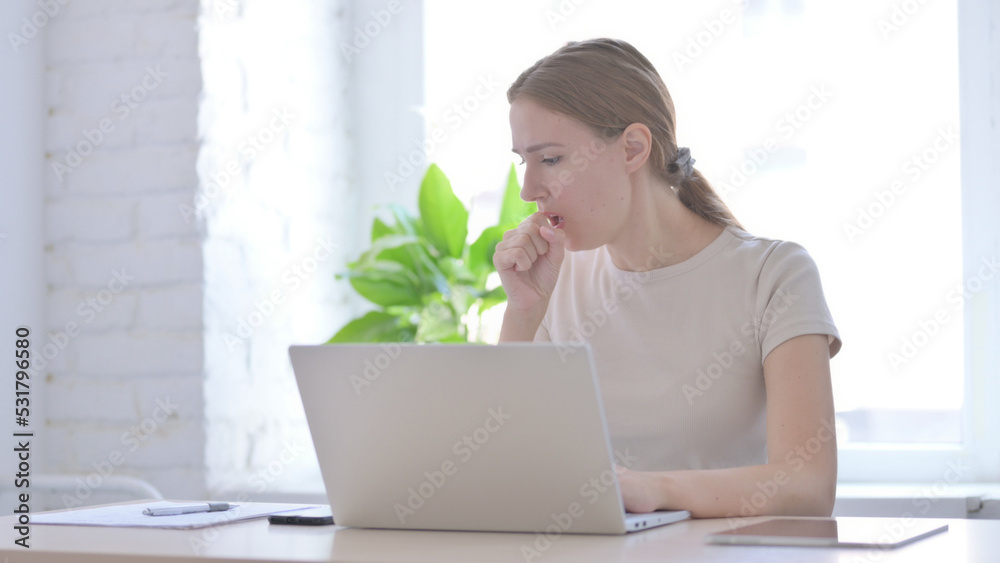Woman Coughing while Working on Laptop Woman Coughing while Working on Laptop