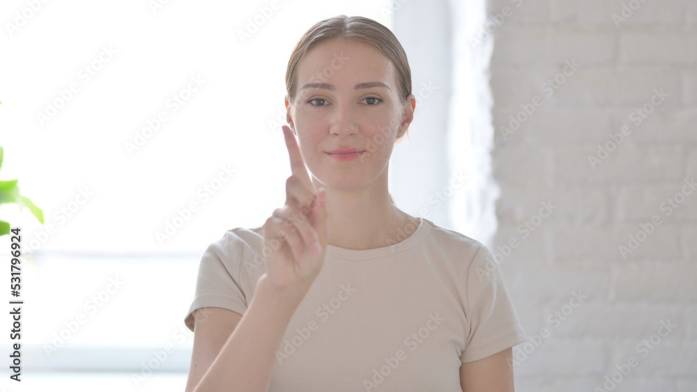 Portrait of Woman Showing No Sign by Finger, Denial