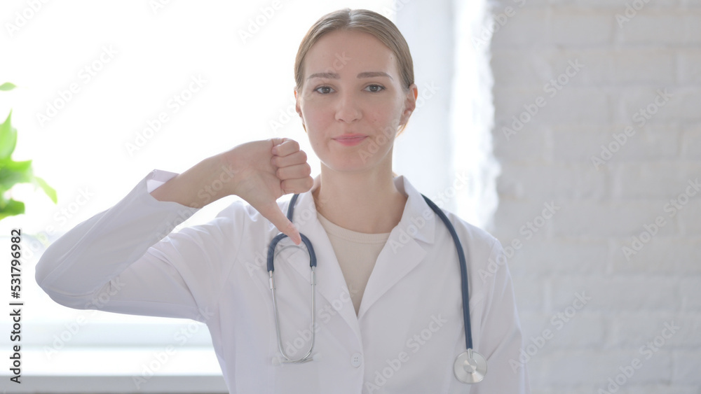 Thumbs Down by Lady Doctor in Clinic